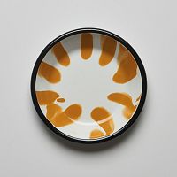 Oranžovo-biely smaltovaný tanier Kapka Little Color, Ø 12 cm